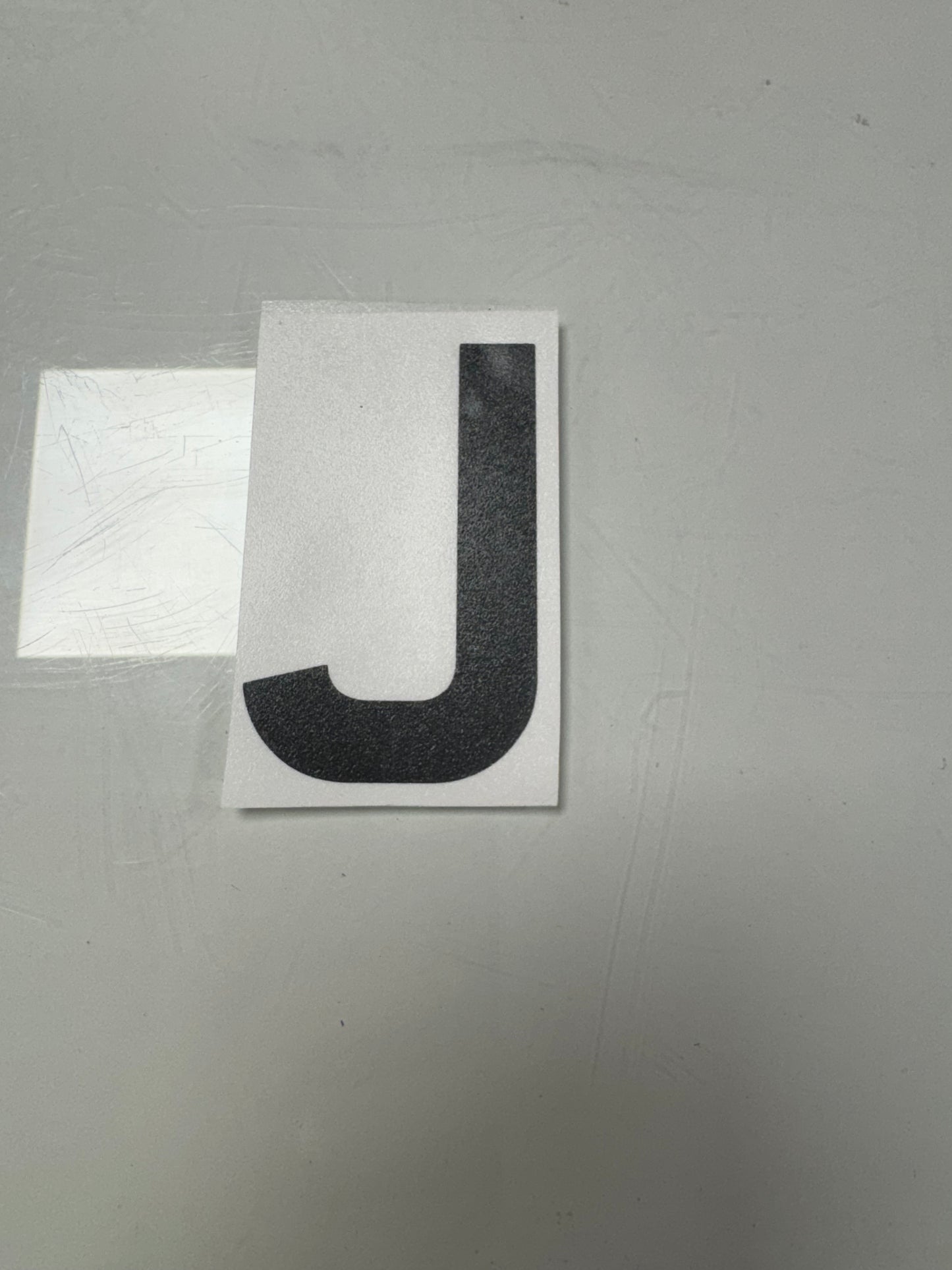 J Anti-flash letter