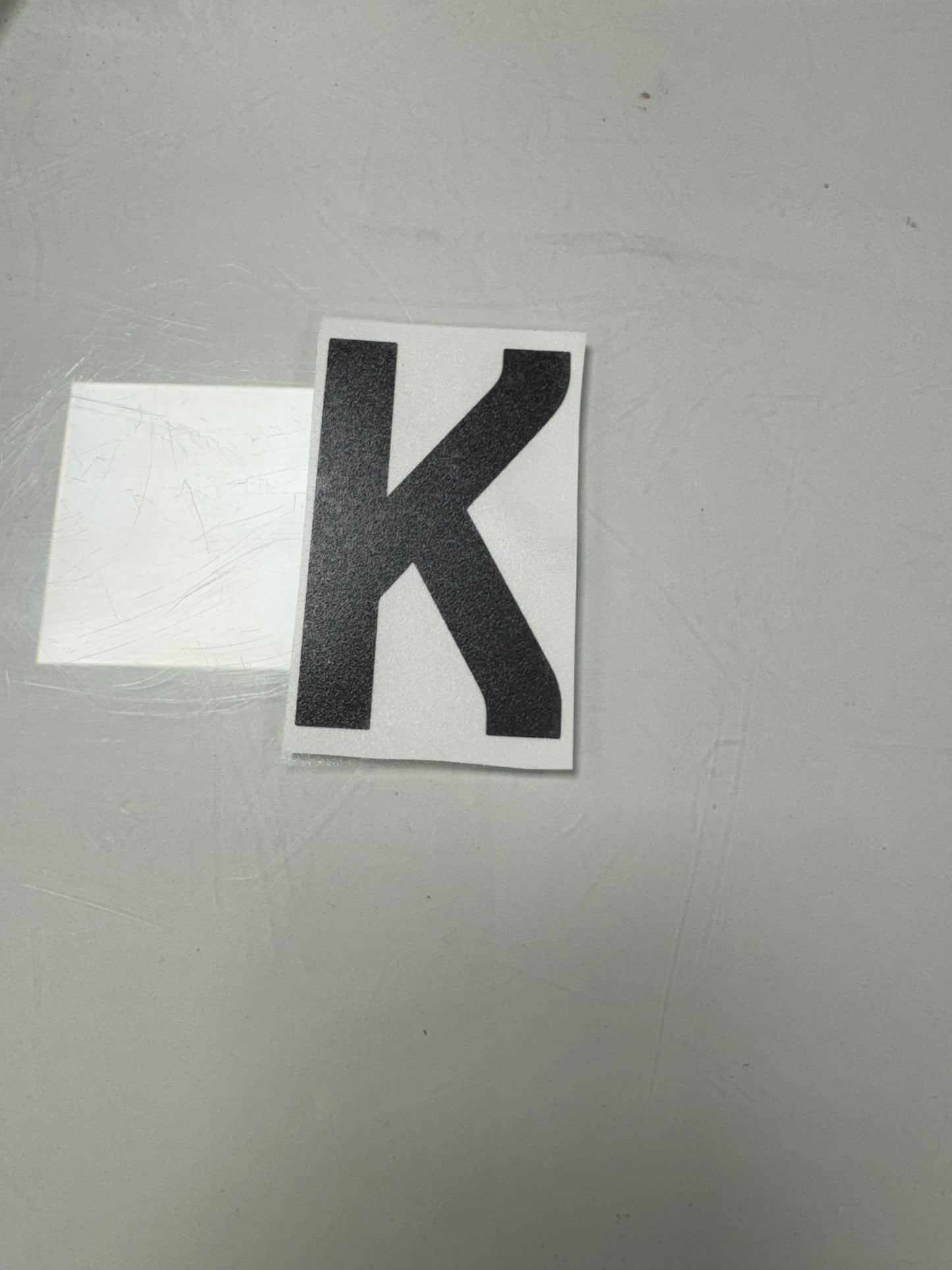 K Anti-flash letter